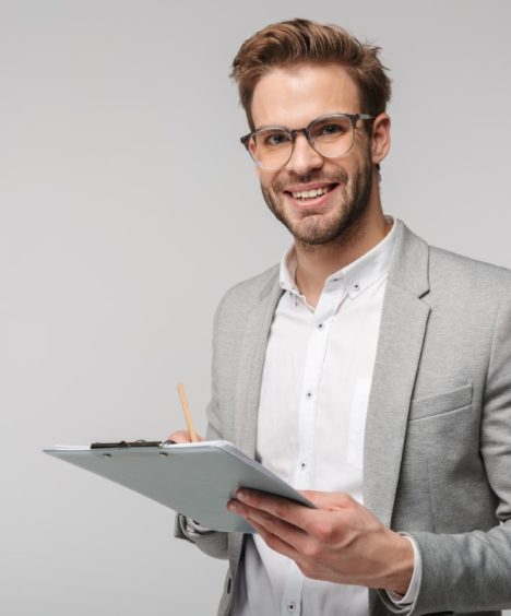 portrait-of-happy-young-man-in-eyeglasses-holding-4U655XX-Custom.jpg